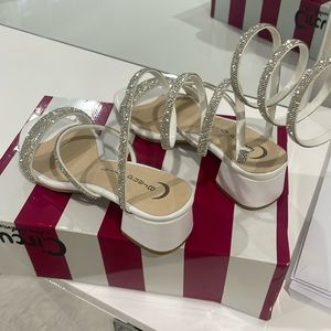 Heeled sandles white strap does up legs size 38. Us 7 shoes